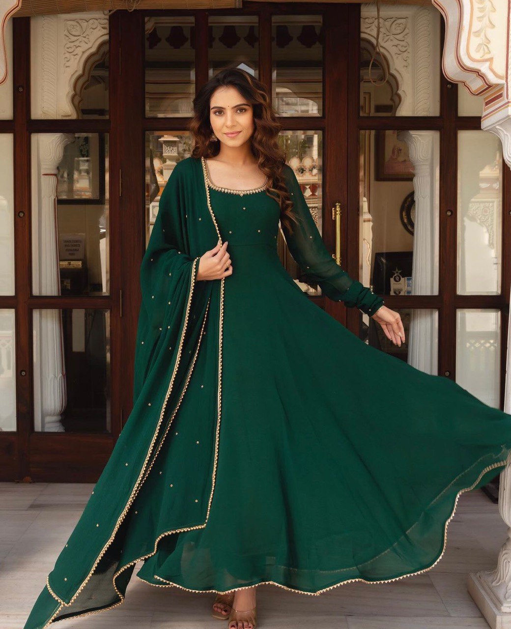 WOMEN'S FLARED GREEN GOWN WITH LACE DUPATTA WOMEN'S FLARED GREEN GOWN WITH LACE DUPATTA