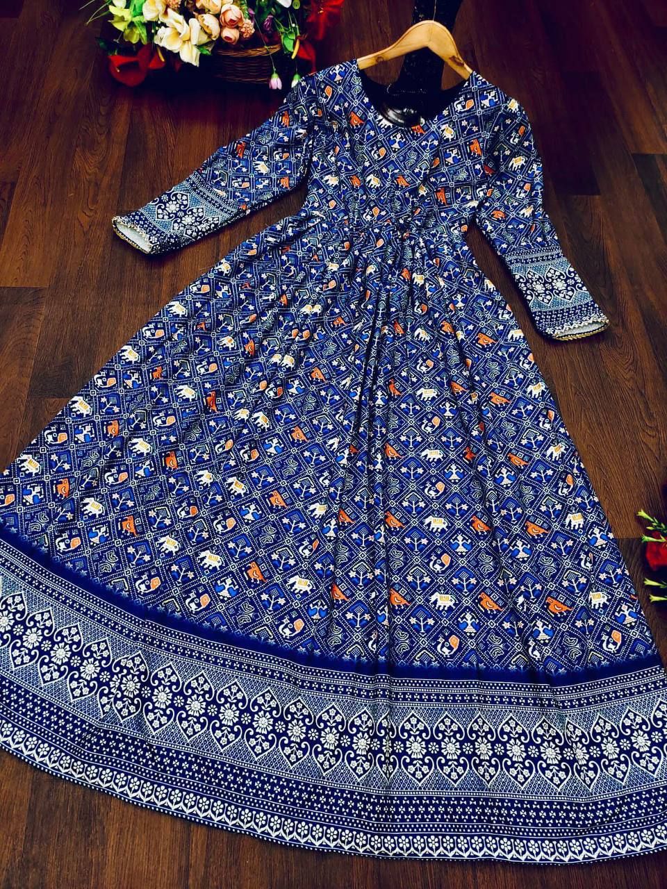 A BEAUTIFUL BLUE PATOLA DRESS WITH BEAUTIFUL SLEEVES BORDER