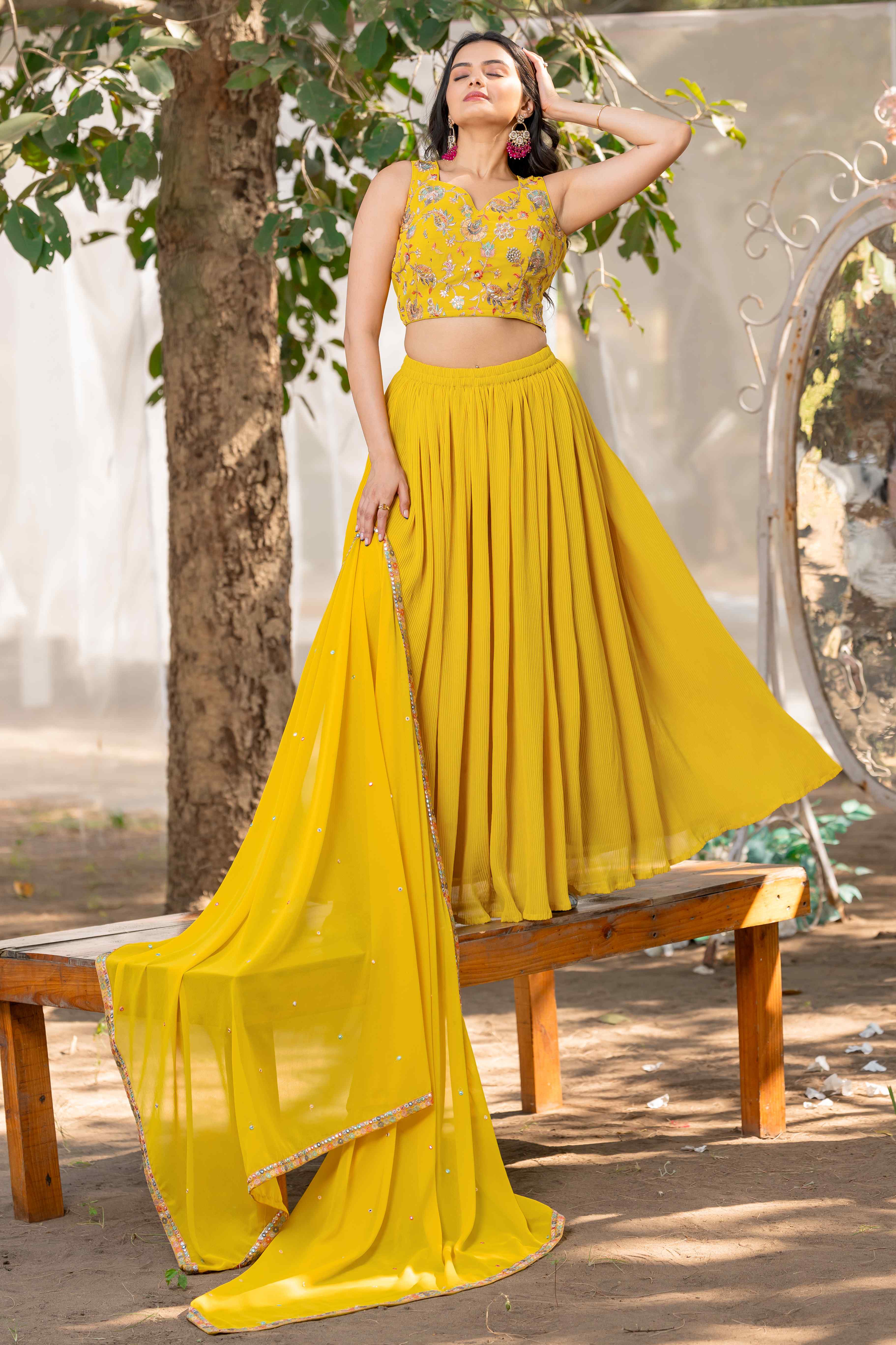 YELLOW FLARED LEHENGA SET WITH BEAUTIFUL EMBROIDERED CHOLI AND EMBROIDERED DUPATTA