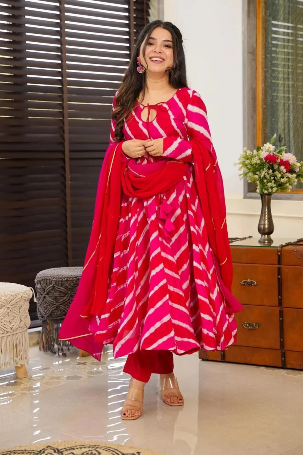 PARTY WEAR LEHERIYA PRINTED FLARED GOWN WITH DUPATTA